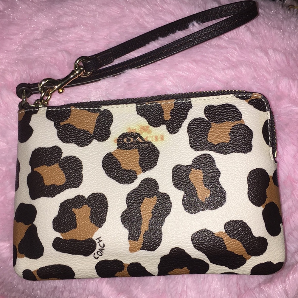 Selling this new coach wristlet